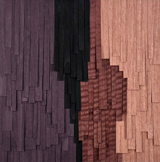 Wooden wall art in various shades of purple, pink and black.